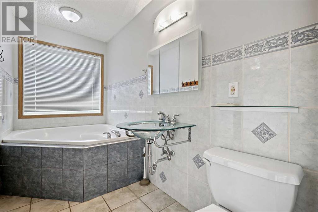 Single Family House 4 Level for Sale in  Hawkhill Way NW Hawkwood Calgary 