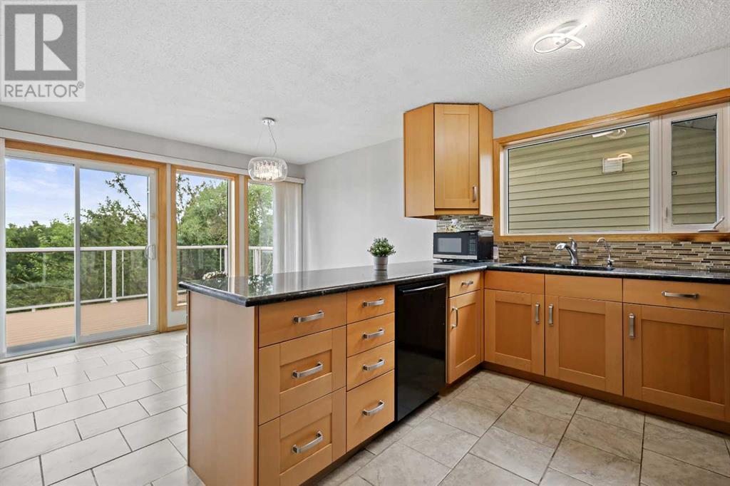 Single Family House 4 Level for Sale in  Hawkhill Way NW Hawkwood Calgary 