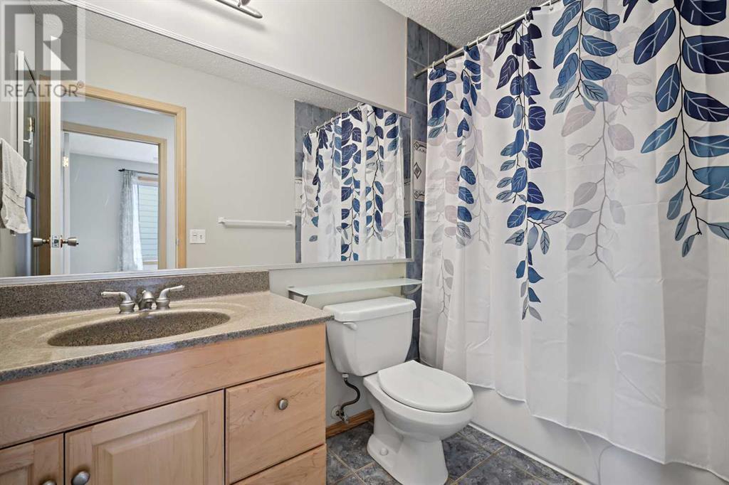Single Family House 4 Level for Sale in  Hawkhill Way NW Hawkwood Calgary 