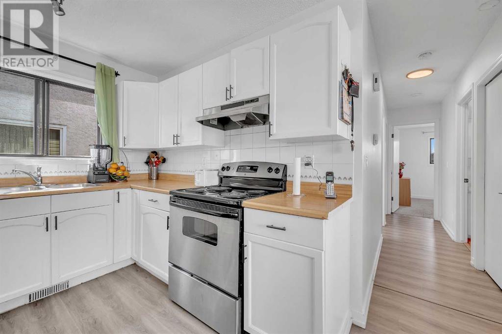 Single Family House Bi-level for Sale in  Taraglen Road NE Taradale Calgary 