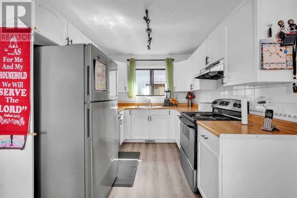 Single Family House Bi-level for Sale in  Taraglen Road NE Taradale Calgary 