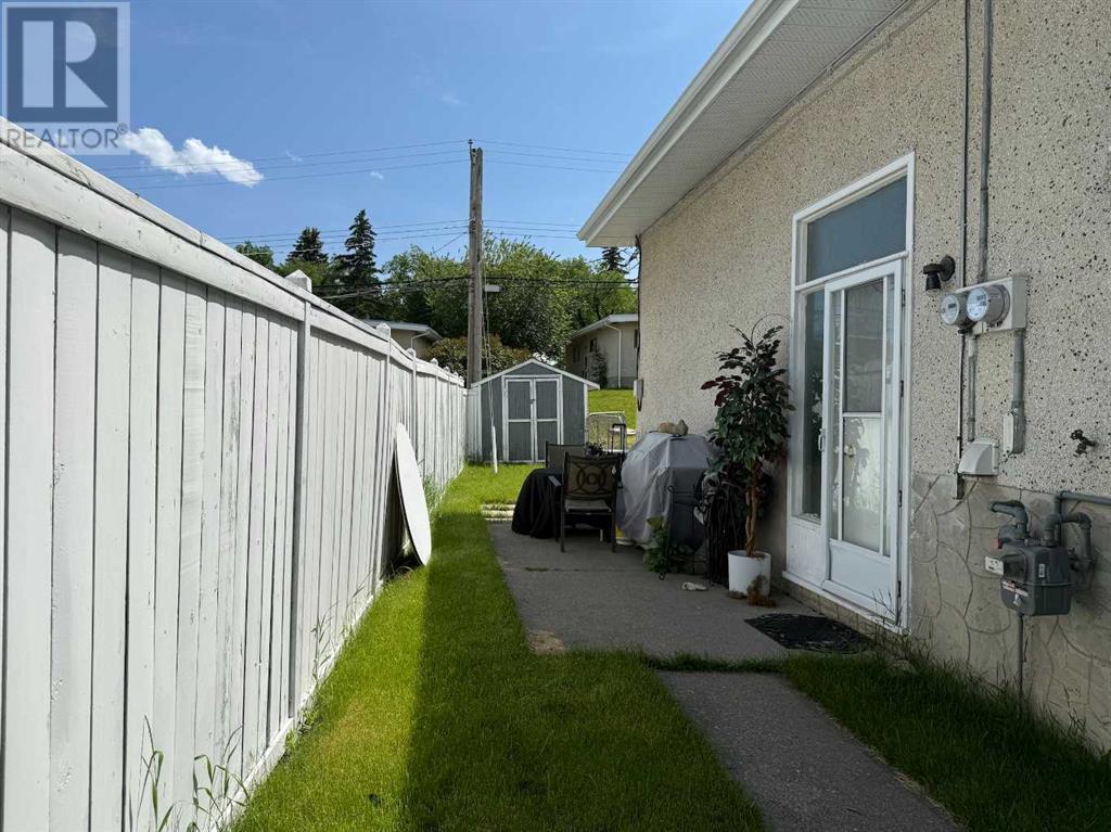 Multi-family House Bi-level for Sale in  &  Huntertown Crescent NW Huntington Hills Calgary 