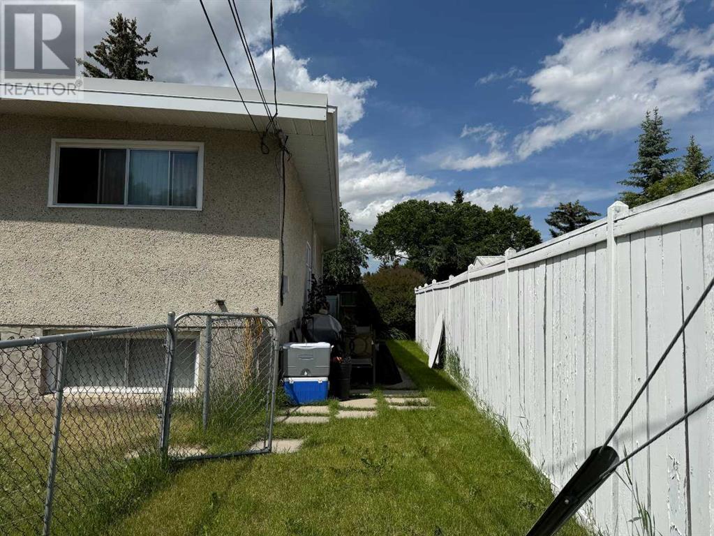 Multi-family House Bi-level for Sale in  &  Huntertown Crescent NW Huntington Hills Calgary 
