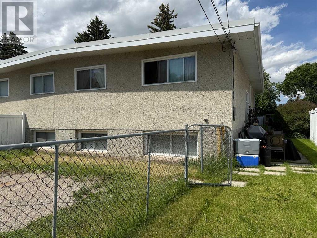 Multi-family House Bi-level for Sale in  &  Huntertown Crescent NW Huntington Hills Calgary 