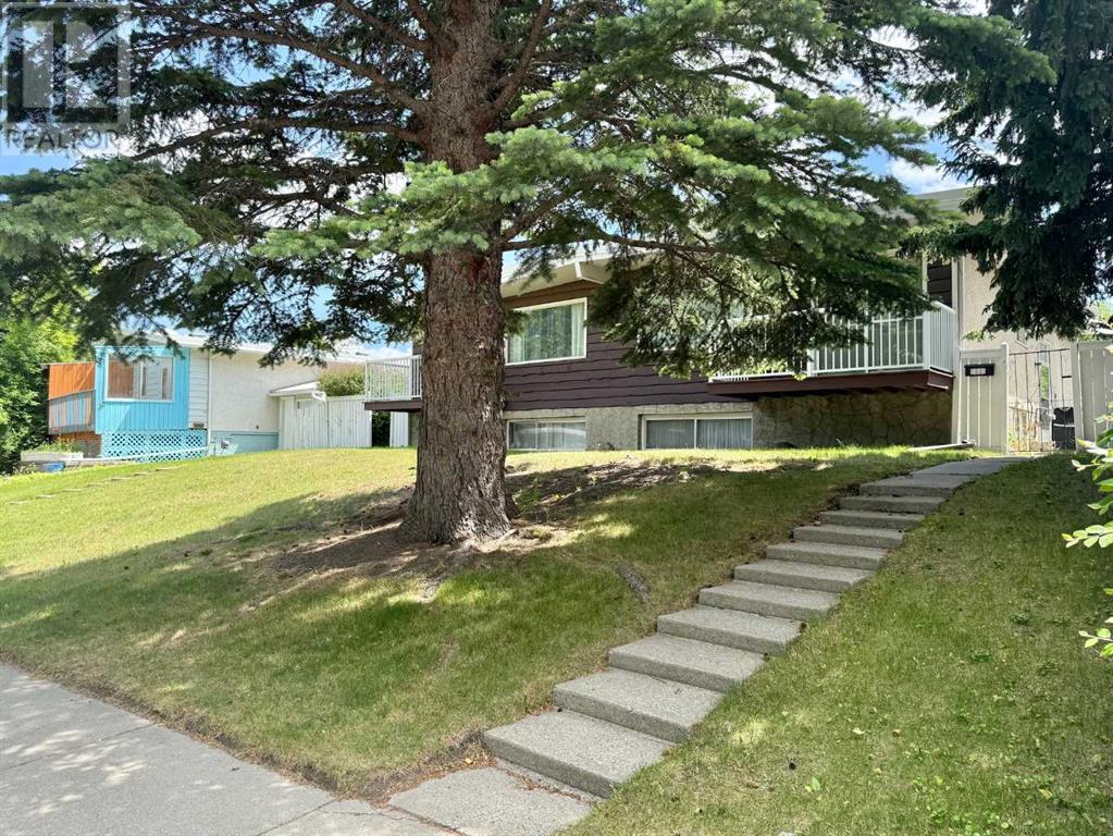 Multi-family House Bi-level for Sale in  &  Huntertown Crescent NW Huntington Hills Calgary 