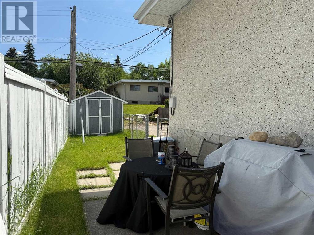 Multi-family House Bi-level for Sale in  &  Huntertown Crescent NW Huntington Hills Calgary 