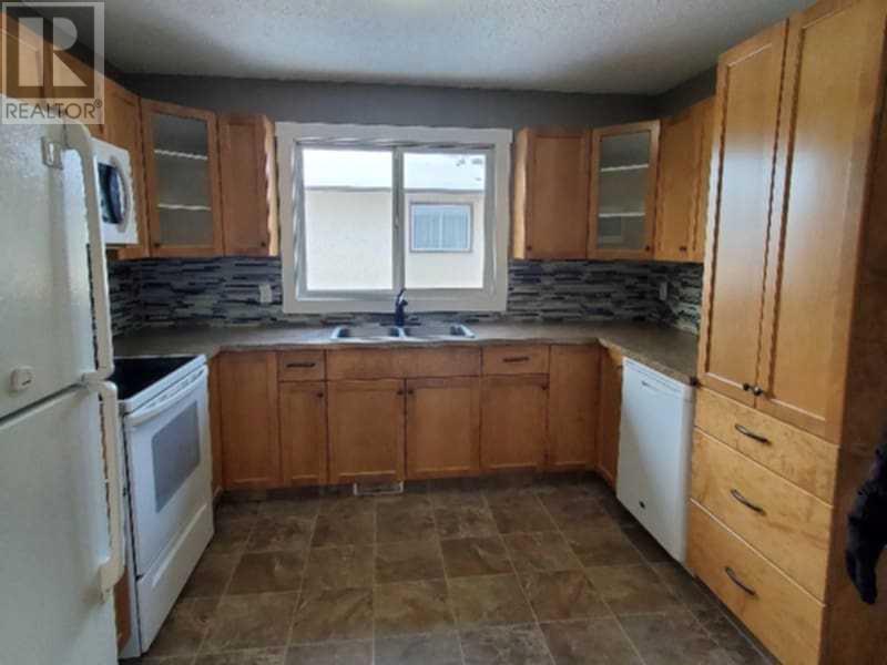 Single Family House Bi-level for Sale in   A Avenue Mountview Grande Prairie 