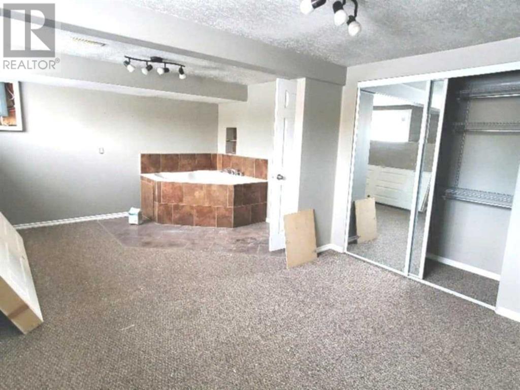 Single Family House Bi-level for Sale in   A Avenue Mountview Grande Prairie 