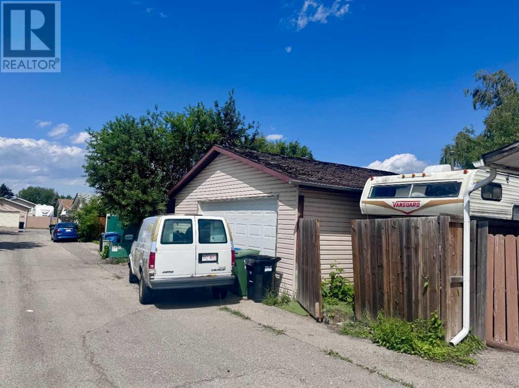 Single Family House 3 Level for Sale in  Pinecliff Way NE Pineridge Calgary 