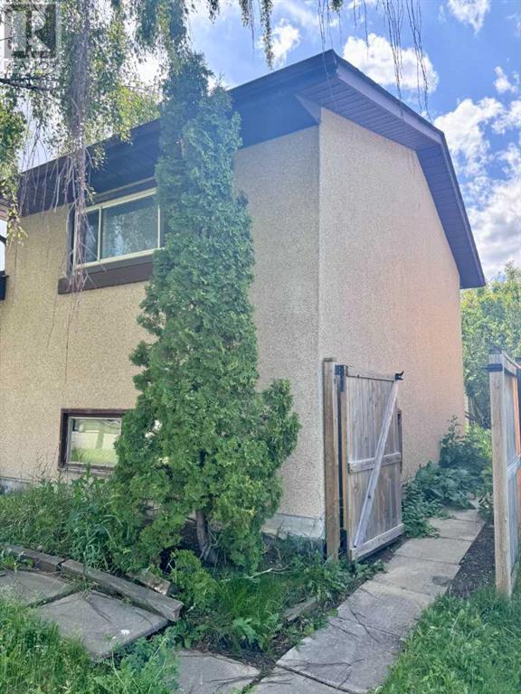 Single Family House 3 Level for Sale in  Pinecliff Way NE Pineridge Calgary 