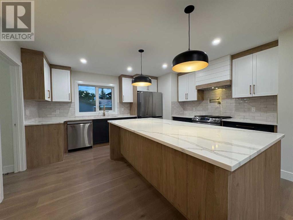 Single Family House Bungalow for Sale in  Adrian Place SE Acadia Calgary 