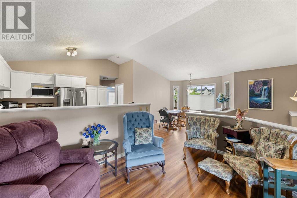 Single Family House Bi-level for Sale in  Covepark Close NE Coventry Hills Calgary 