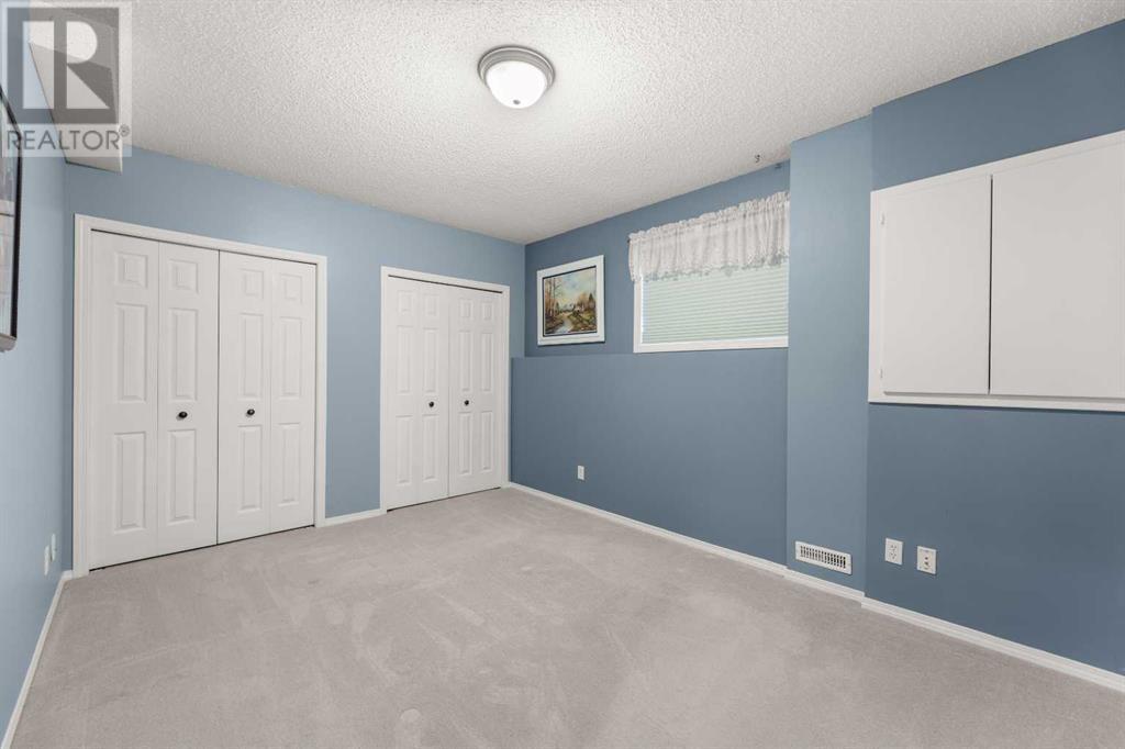 Single Family House Bi-level for Sale in  Covepark Close NE Coventry Hills Calgary 