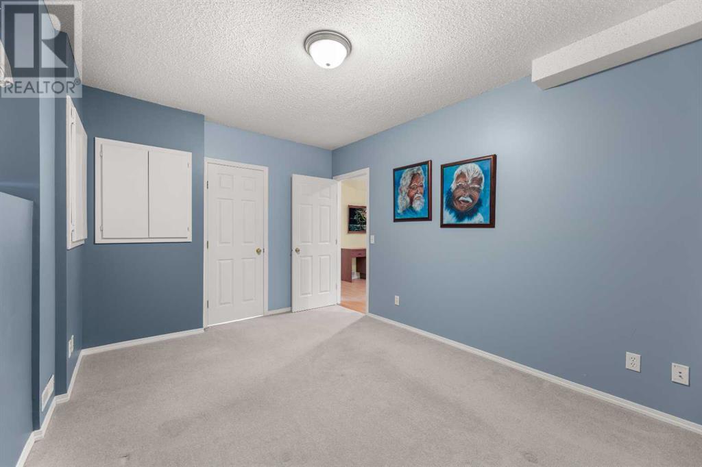 Single Family House Bi-level for Sale in  Covepark Close NE Coventry Hills Calgary 