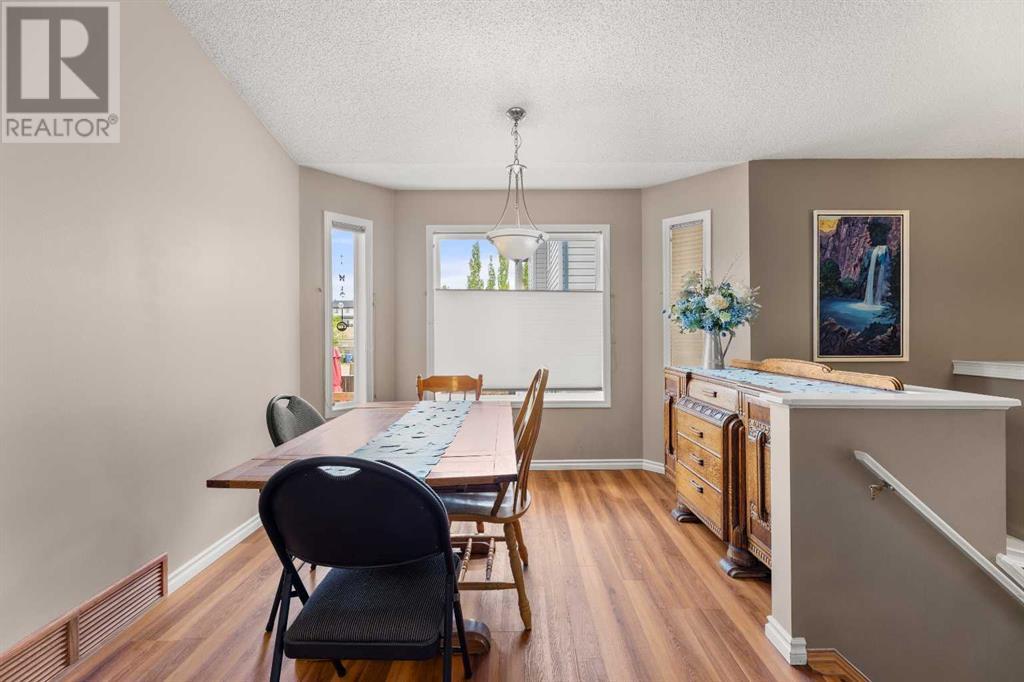 Single Family House Bi-level for Sale in  Covepark Close NE Coventry Hills Calgary 