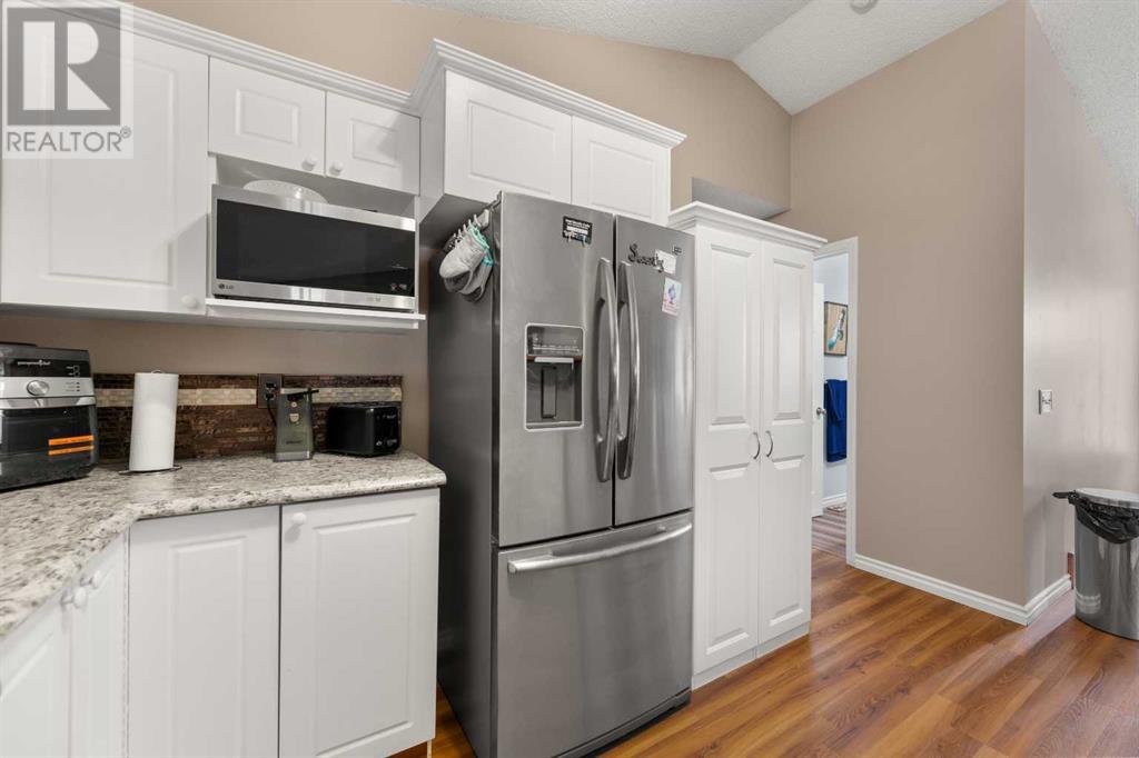 Single Family House Bi-level for Sale in  Covepark Close NE Coventry Hills Calgary 