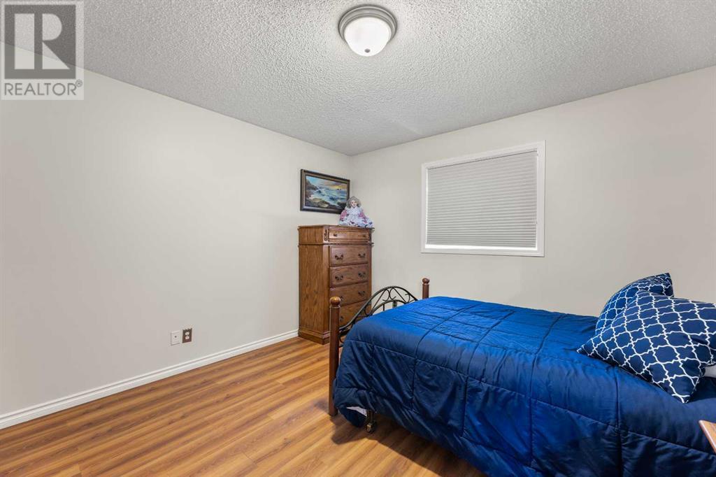 Single Family House Bi-level for Sale in  Covepark Close NE Coventry Hills Calgary 