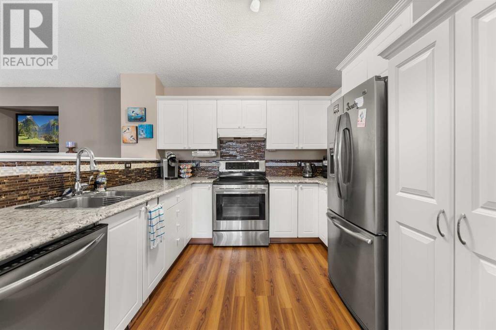 Single Family House Bi-level for Sale in  Covepark Close NE Coventry Hills Calgary 