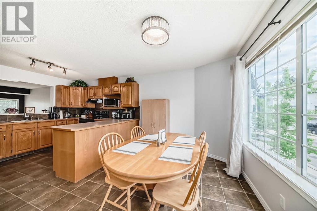 Single Family House 4 Level for Sale in  Kingsland Court SW Kingsland Calgary 