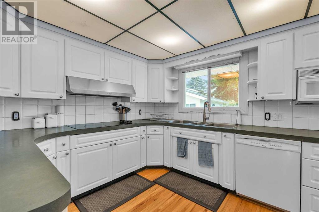 Single Family House Bungalow for Sale in  Halifax Crescent NW Banff Trail Calgary 