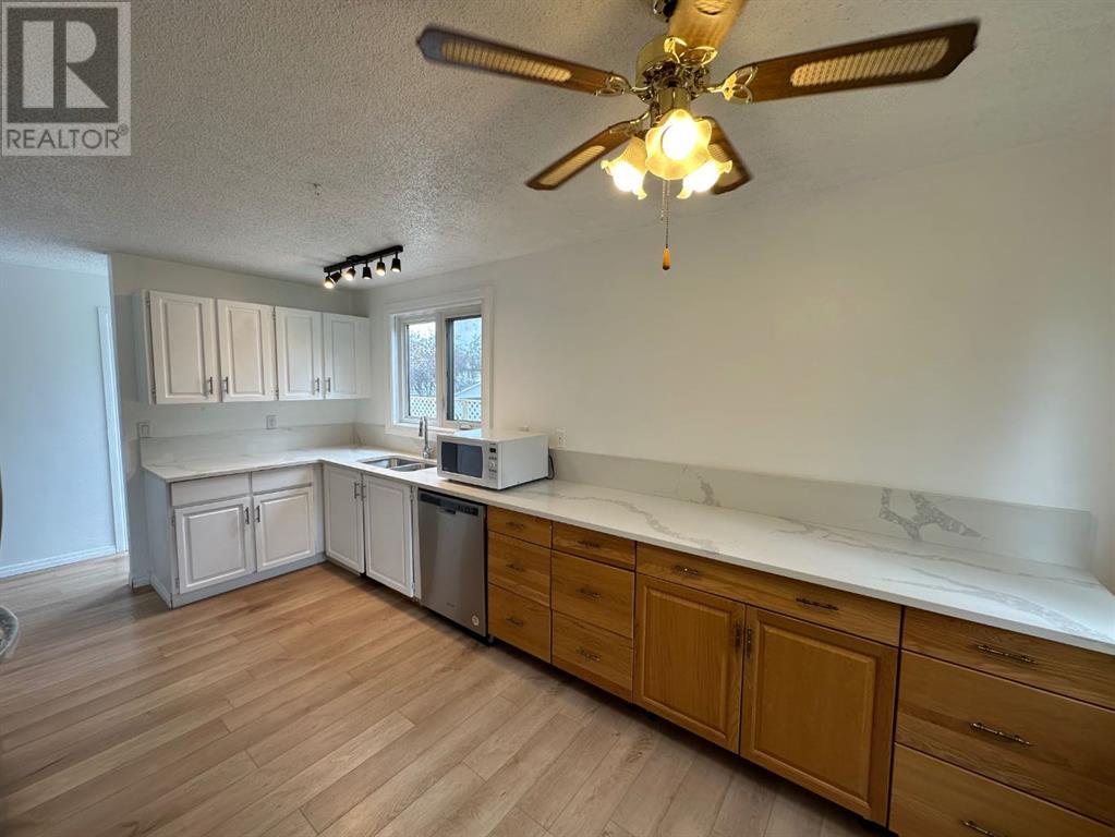 Single Family House Bungalow for Sale in  Macewan Drive NW MacEwan Glen Calgary 