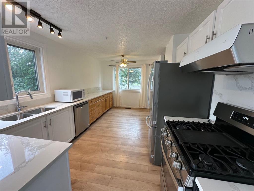 Single Family House Bungalow for Sale in  Macewan Drive NW MacEwan Glen Calgary 