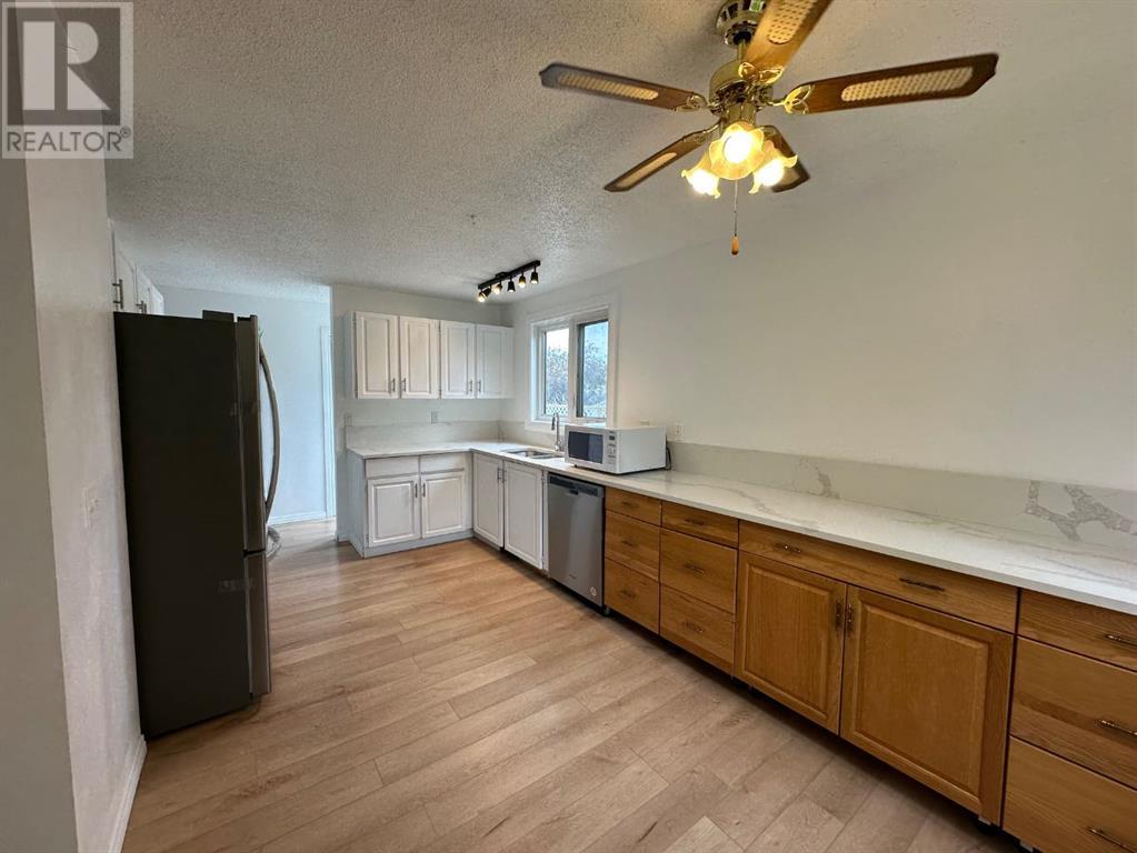 Single Family House Bungalow for Sale in  Macewan Drive NW MacEwan Glen Calgary 
