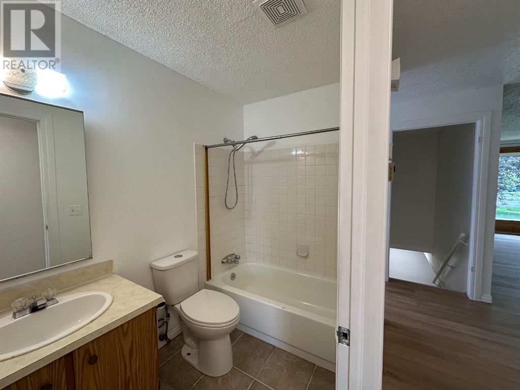 Single Family House Bungalow for Sale in  Macewan Drive NW MacEwan Glen Calgary 