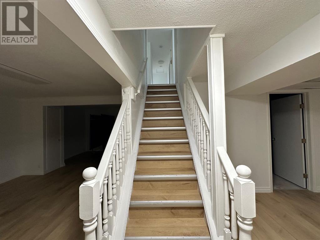 Single Family House Bungalow for Sale in  Macewan Drive NW MacEwan Glen Calgary 