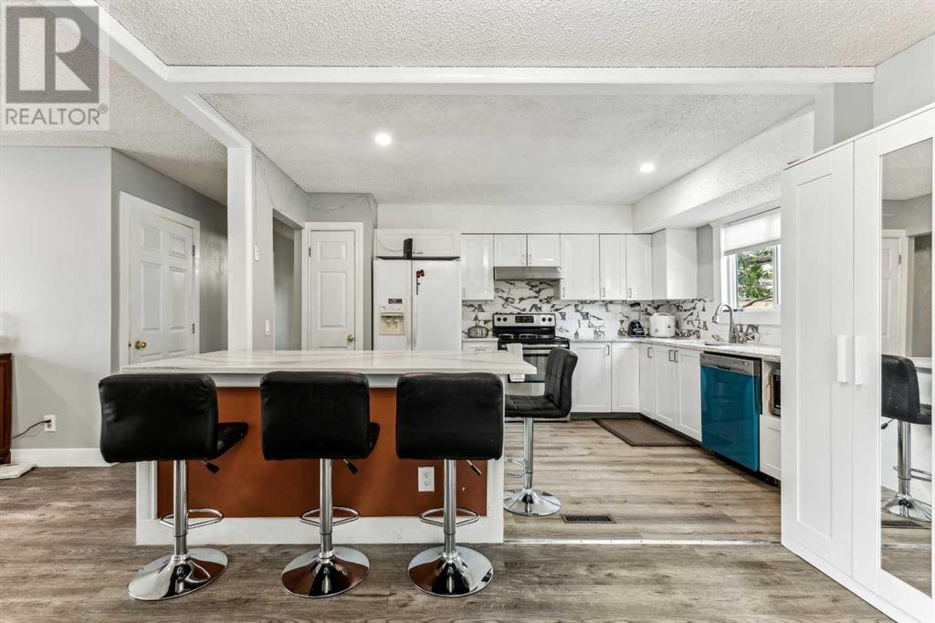 Single Family House Bi-level for Sale in  Ranchero Rise NW Ranchlands Calgary 
