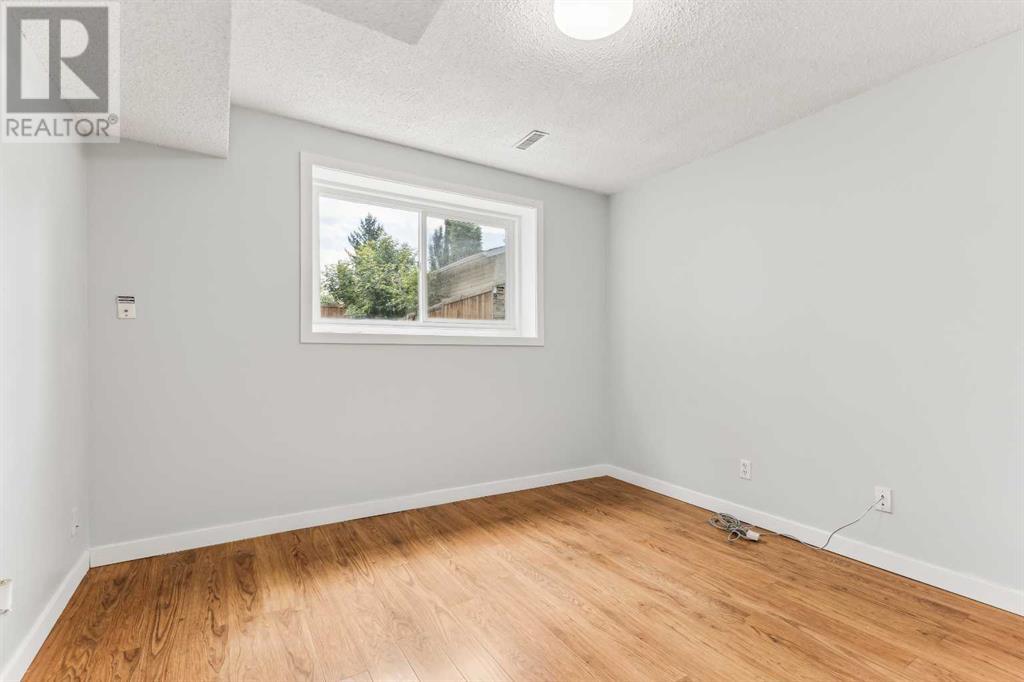 Single Family House Bi-level for Sale in  Ranchero Rise NW Ranchlands Calgary 