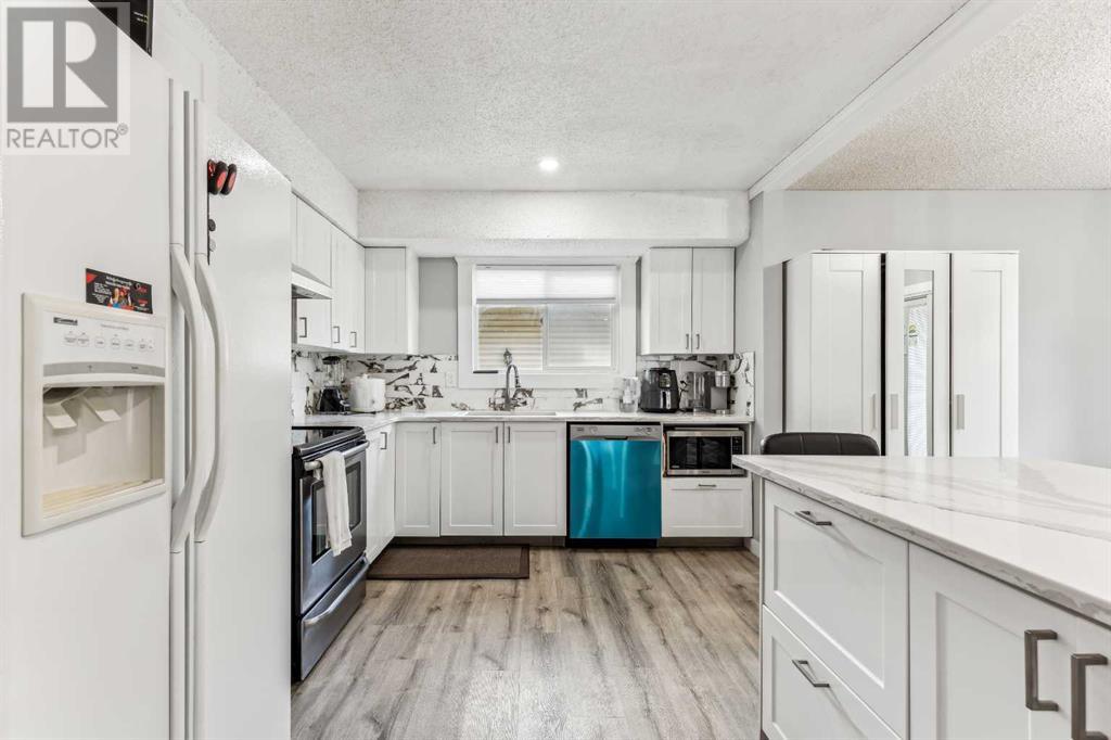 Single Family House Bi-level for Sale in  Ranchero Rise NW Ranchlands Calgary 