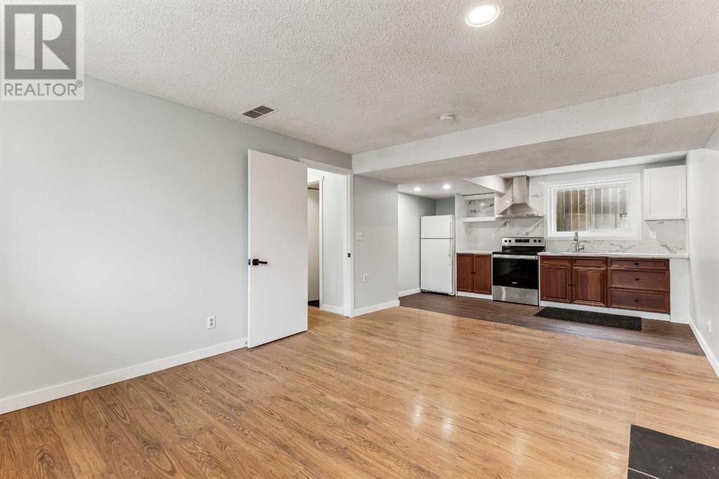 Single Family House Bi-level for Sale in  Ranchero Rise NW Ranchlands Calgary 