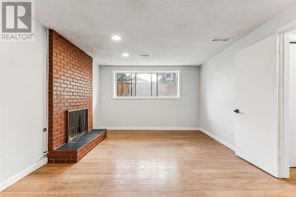 Single Family House Bi-level for Sale in  Ranchero Rise NW Ranchlands Calgary 