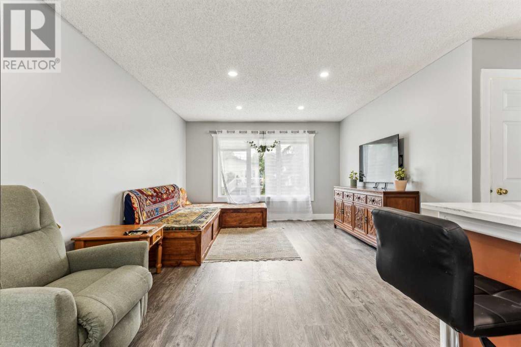 Single Family House Bi-level for Sale in  Ranchero Rise NW Ranchlands Calgary 