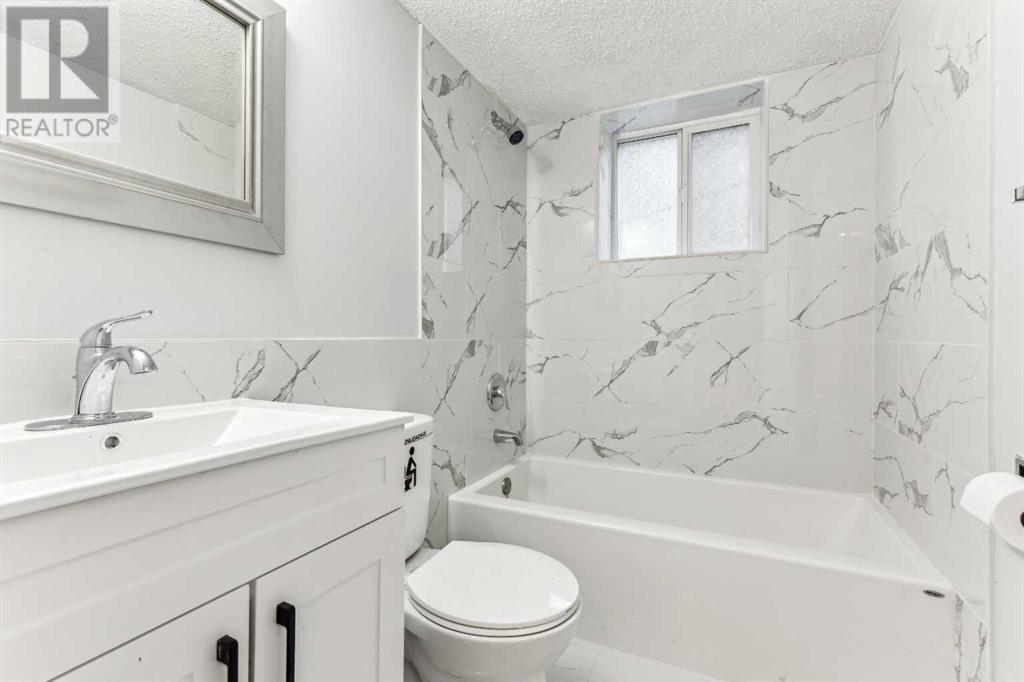 Single Family House Bi-level for Sale in  Ranchero Rise NW Ranchlands Calgary 