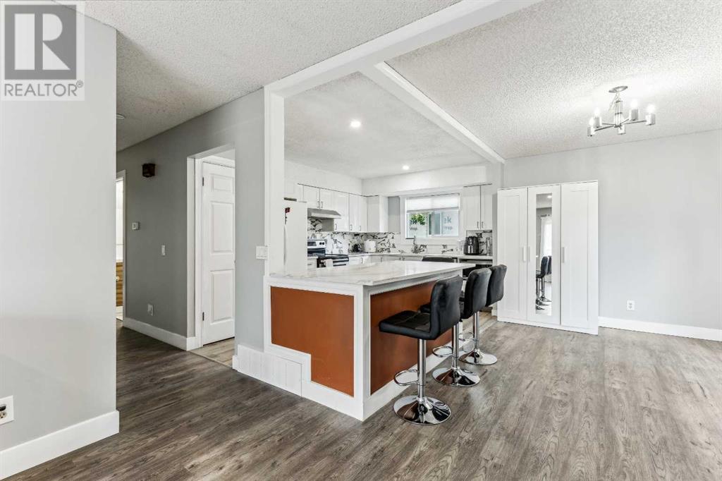 Single Family House Bi-level for Sale in  Ranchero Rise NW Ranchlands Calgary 