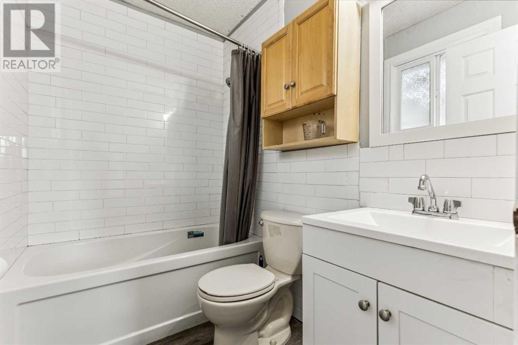 Single Family House Bi-level for Sale in  Ranchero Rise NW Ranchlands Calgary 