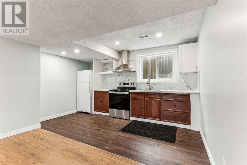 Single Family House Bi-level for Sale in  Ranchero Rise NW Ranchlands Calgary 