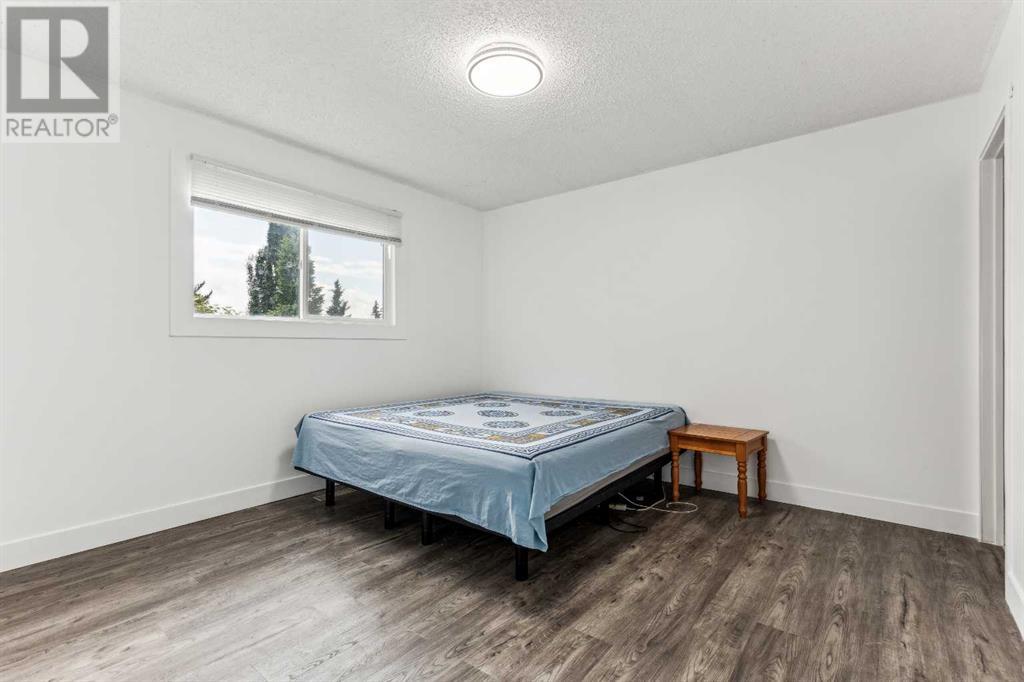Single Family House Bi-level for Sale in  Ranchero Rise NW Ranchlands Calgary 