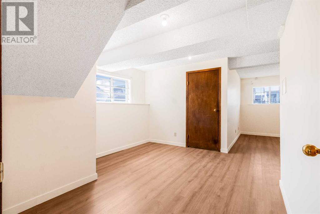 Single Family House Bi-level for Sale in  Erin Grove Place SE Erin Woods Calgary 