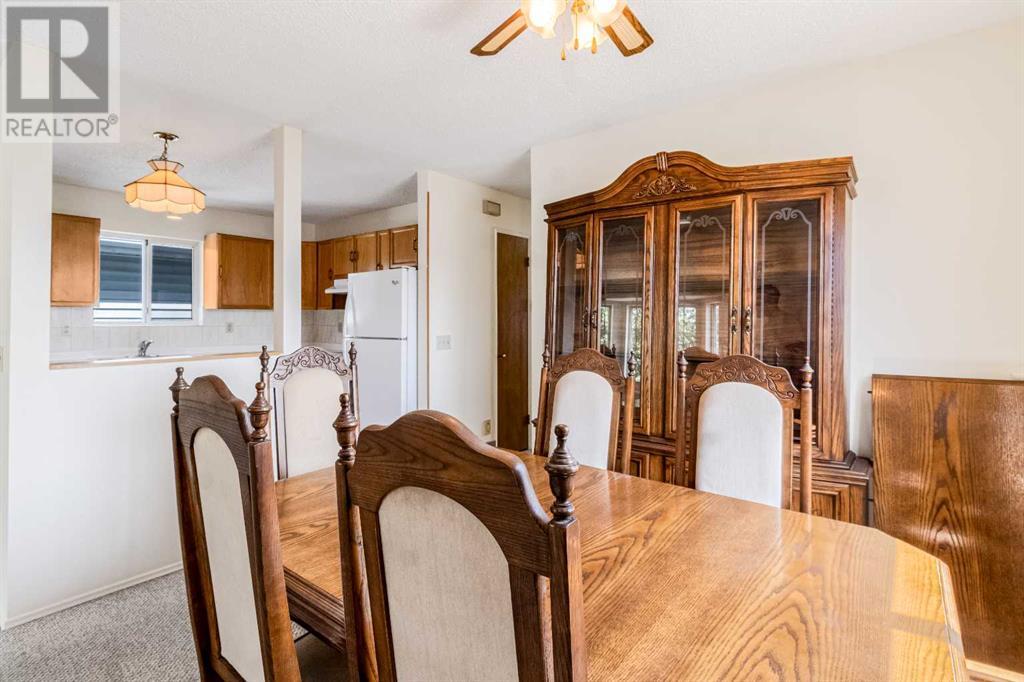 Single Family House Bi-level for Sale in  Erin Grove Place SE Erin Woods Calgary 