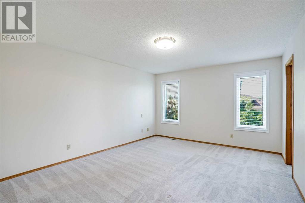 Single Family House for Sale in  Hawkbury Place NW Hawkwood Calgary 