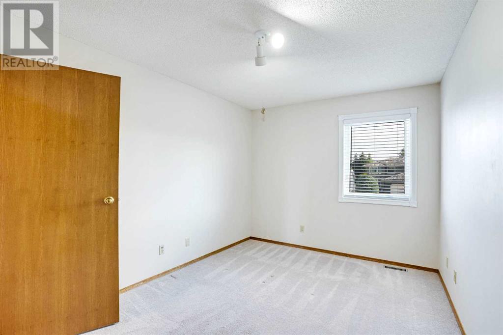 Single Family House for Sale in  Hawkbury Place NW Hawkwood Calgary 