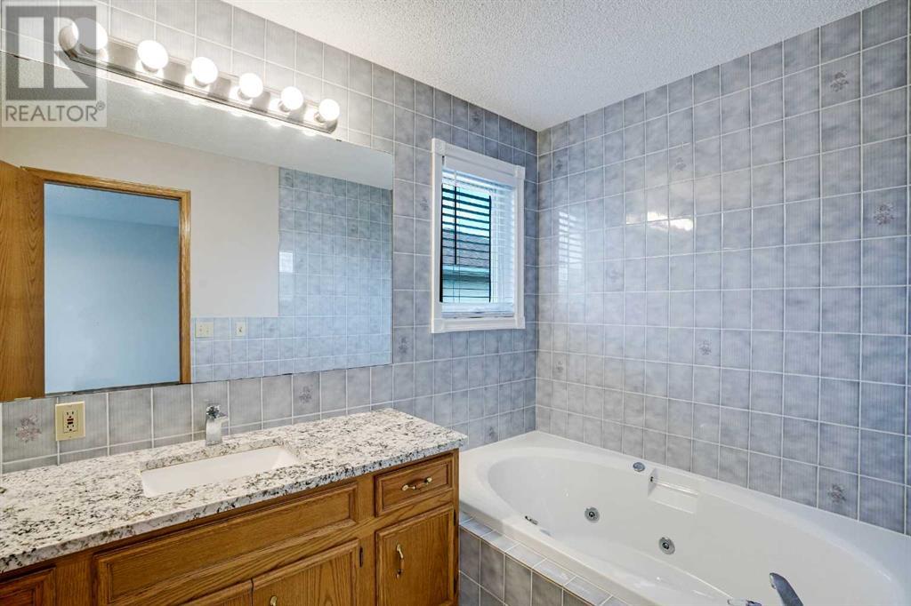 Single Family House for Sale in  Hawkbury Place NW Hawkwood Calgary 