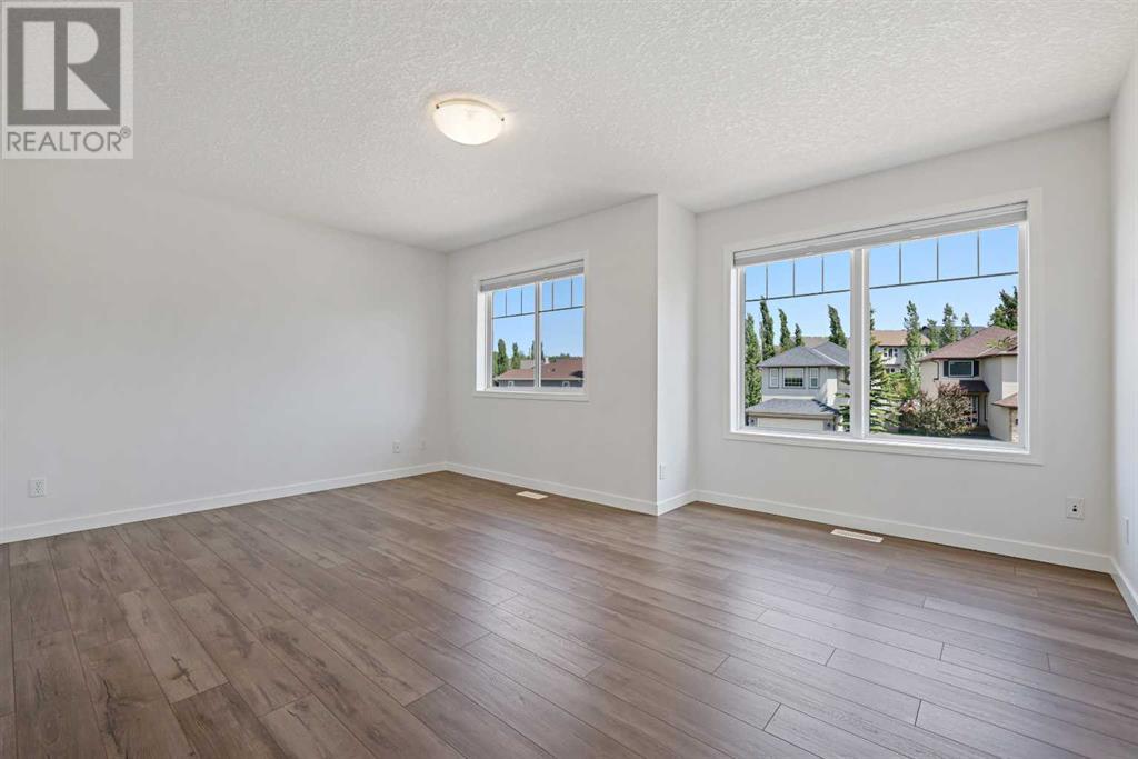 Single Family House for Sale in  Rockyspring Green NW Rocky Ridge Calgary 