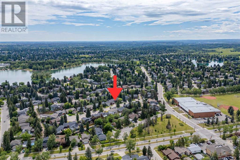 Single Family House for Sale in  Lake Moraine Place SE Lake Bonavista Calgary 