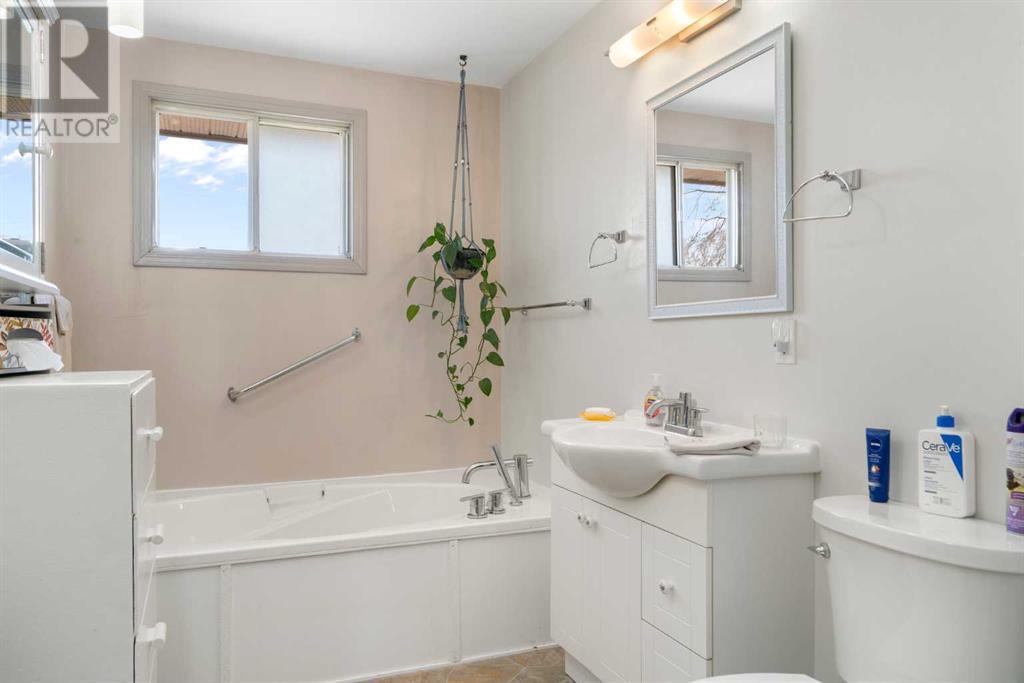Single Family House Bungalow for Sale in  Queensland Circle SE Queensland Calgary 
