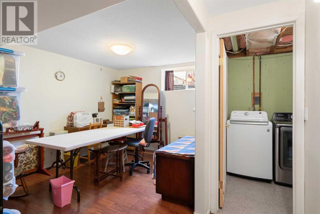 Single Family House Bungalow for Sale in  Queensland Circle SE Queensland Calgary 