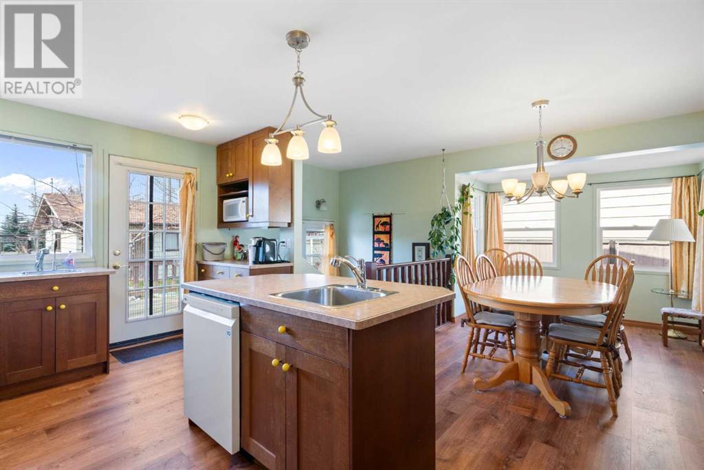 Single Family House Bungalow for Sale in  Queensland Circle SE Queensland Calgary 